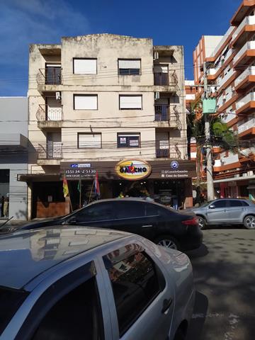 Apartamento com tres dormitórios e garagem